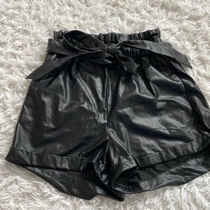 Black leather bow wrap shorts